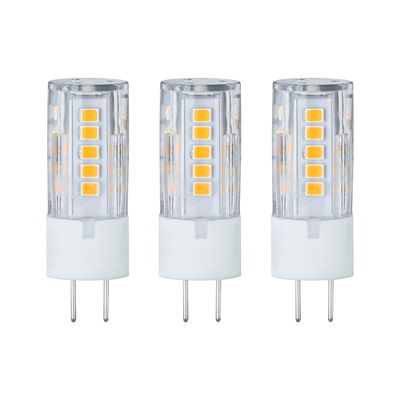 Three transparent LED bulbs with white bases and yellow diodes for energy-efficient lighting solutions