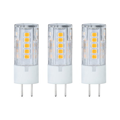 Trois ampoules LED transparentes avec socles blancs et diodes jaunes pour éclairage économique