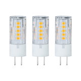 Drei transparente LED-Lampen mit weißen Sockeln und gelben Leuchtdioden für energiesparende Beleuchtung