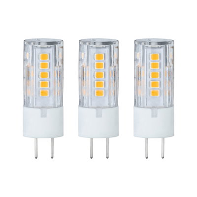 Drei transparente LED-Lampen mit weißen Sockeln und gelben Leuchtdioden für energiesparende Beleuchtung