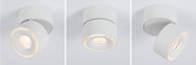 Modern white metal ceiling spotlight with warm white LED ring for adjustable lighting