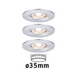 Three white metal recessed spotlights with 35 mm diameter for modern LED lighting