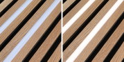 Nahaufnahme von Holzlamellen mit integriertem LED-Lichtstreifen in natürlicher Eiche und warmweißem Licht