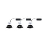 Three black recessed spotlights with white LED modules and connection boxes for modern LED lighting