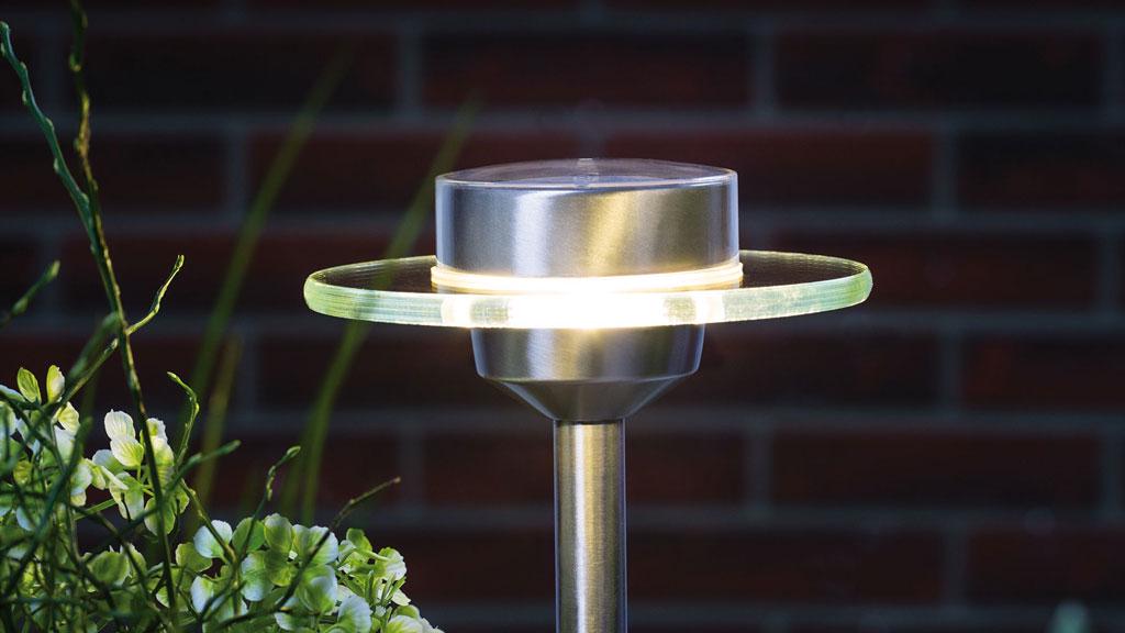 Modern stainless steel garden light with round glass ring and warm white LED for outdoor lighting