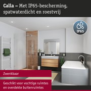 Moderne badkamer met witte wastafel, houten kast en grijze badkuip in stijlvol design