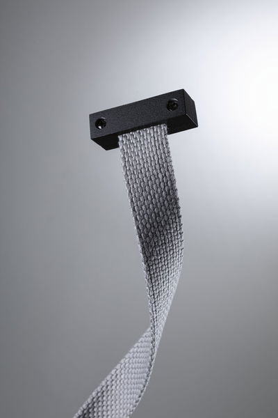 Grey textile strap with black metal holder for flexible mounting, modern design.