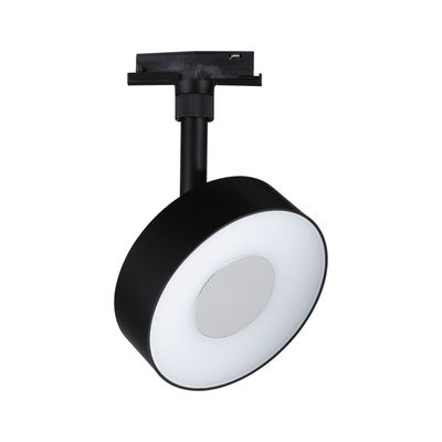 Zwarte LED-spot met ronde witte diffuser en metalen middenstuk voor moderne binnenverlichting
