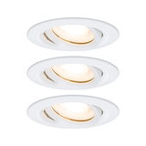 Three white plastic recessed spotlights with warm white light for modern indoor lighting