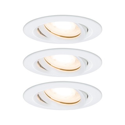 Three white plastic recessed spotlights with warm white light for modern indoor lighting