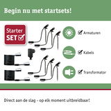 Starterset met zwarte LED-tuinschijnwerpers, kabels en transformator voor eenvoudige buitenverlichting.