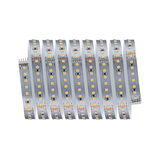 Flexible LED strip with warm white LEDs on silver circuit board for versatile lighting applications