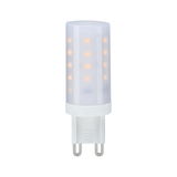 Compact white LED lamp with G9 base emitting warm white light for energy-efficient lighting