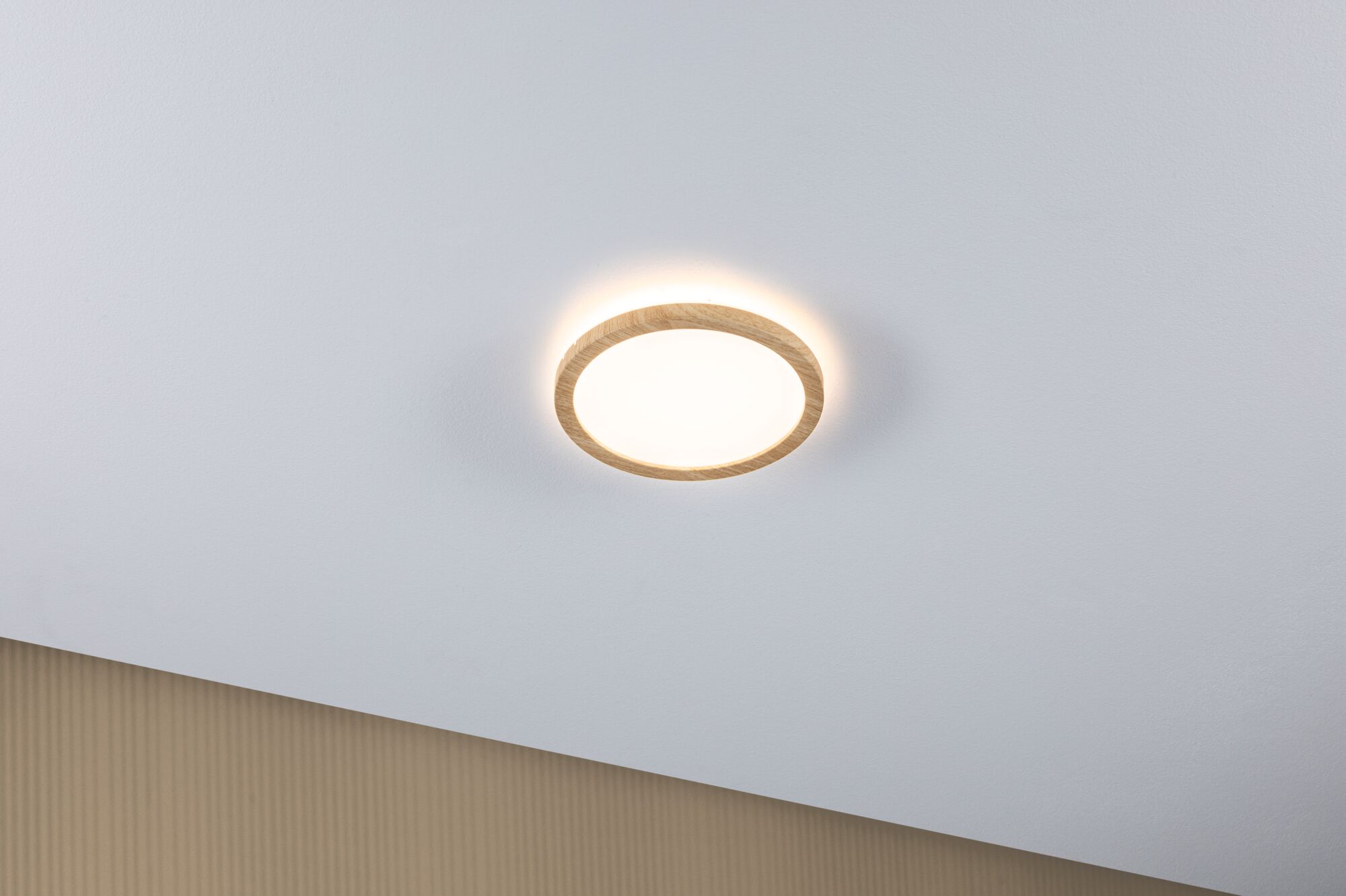 Round ceiling light with wooden frame and warm white light for modern home ambiance