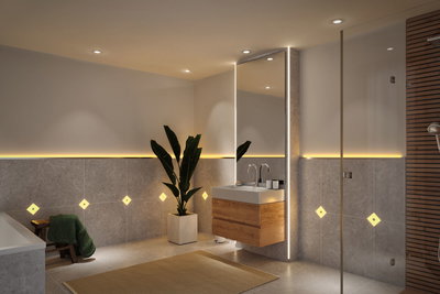 Modern bathroom with grey tiles, wooden vanity and warm white LED accent lighting for ambiance