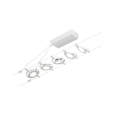 Modern white LED cable system with five round spotlights and control unit for flexible room lighting