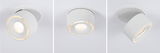 Modern white metal LED ceiling spotlight with warm white light and adjustable head for accent lighting