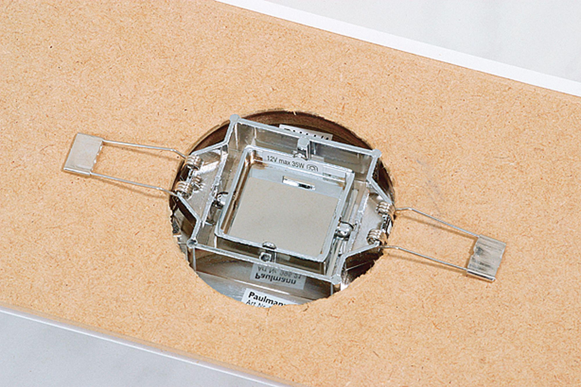 Square metal recessed spotlight in silver with spring clips for ceiling installation