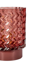 Red glass candle holder with zigzag pattern and matte base for decorative home lighting