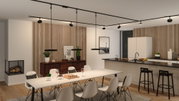 Modern kitchen with black LED pendant lights and ceiling track system, wood accents and white furniture