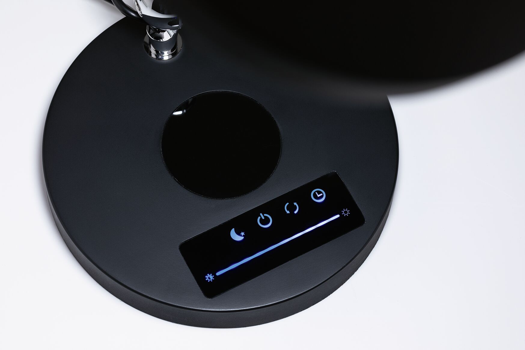 Black round LED desk lamp with touch control panel and brightness slider for modern lighting
