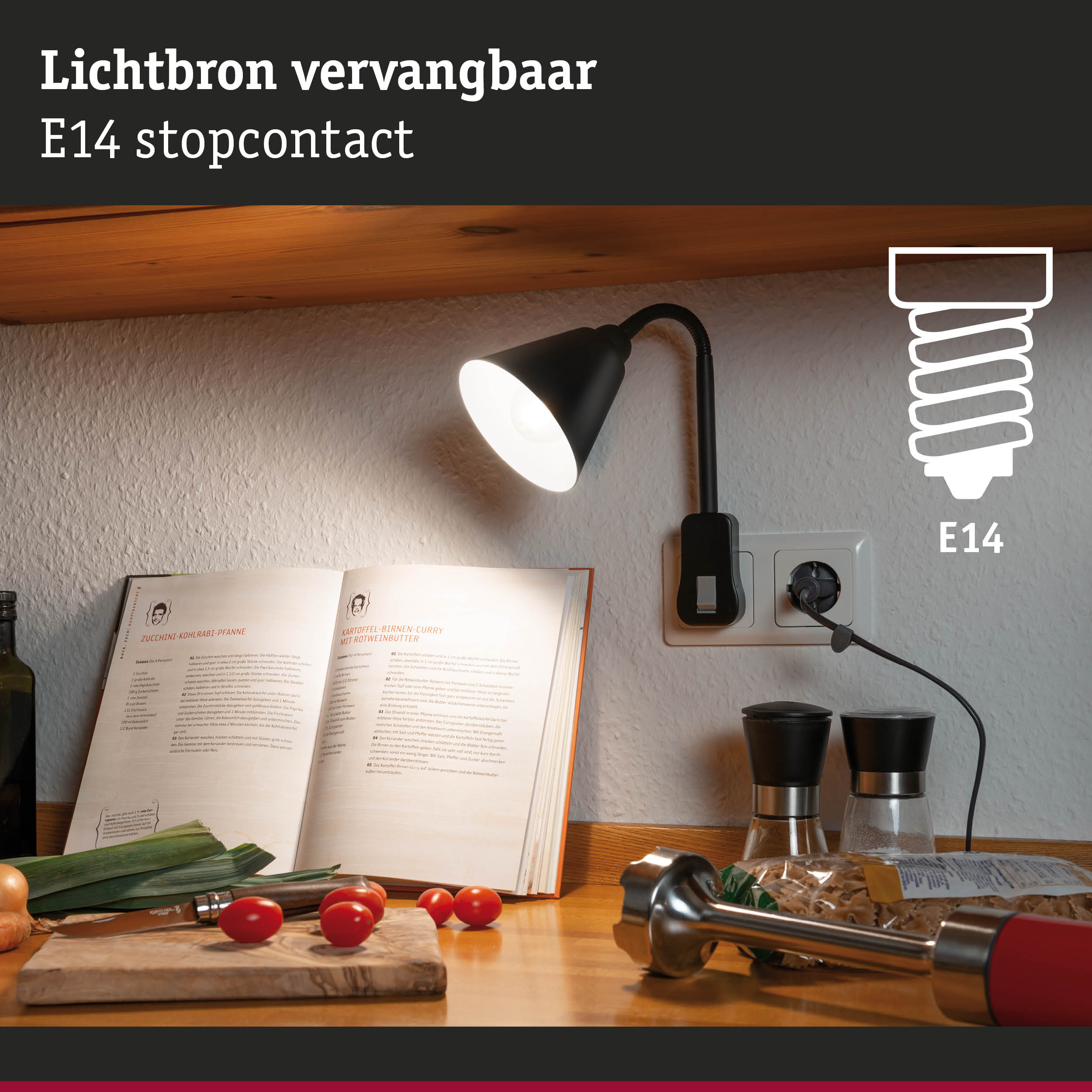 Zwarte leeslamp met E14 fitting aan wandcontactdoos, verlicht kookboek en keukenblad