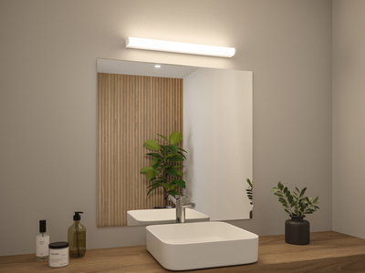 Salle de bain moderne avec lavabo en céramique blanc, plan de travail en bois et éclairage miroir LED