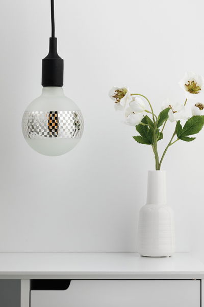Modern pendant light with matte white glass bulb and silver checkered pattern, black cable, home lighting