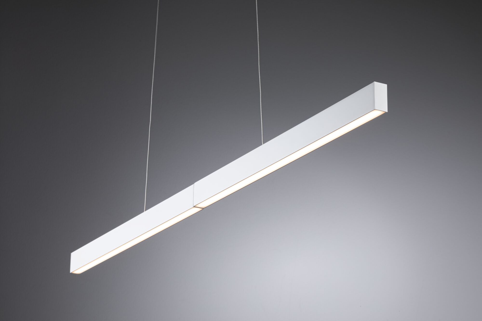 Minimalistische weiße LED-Pendelleuchte aus Aluminium mit warmweißem Licht für moderne Räume
