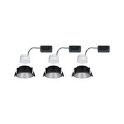 Trois spots encastrés noirs avec modules LED blancs et câbles noirs pour éclairage intérieur moderne