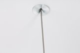 Ceiling with brushed aluminum suspension point and grey textile cable for modern LED lighting.