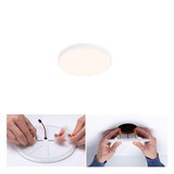 Round white LED ceiling light made of plastic with mounting clips and easy installation.
