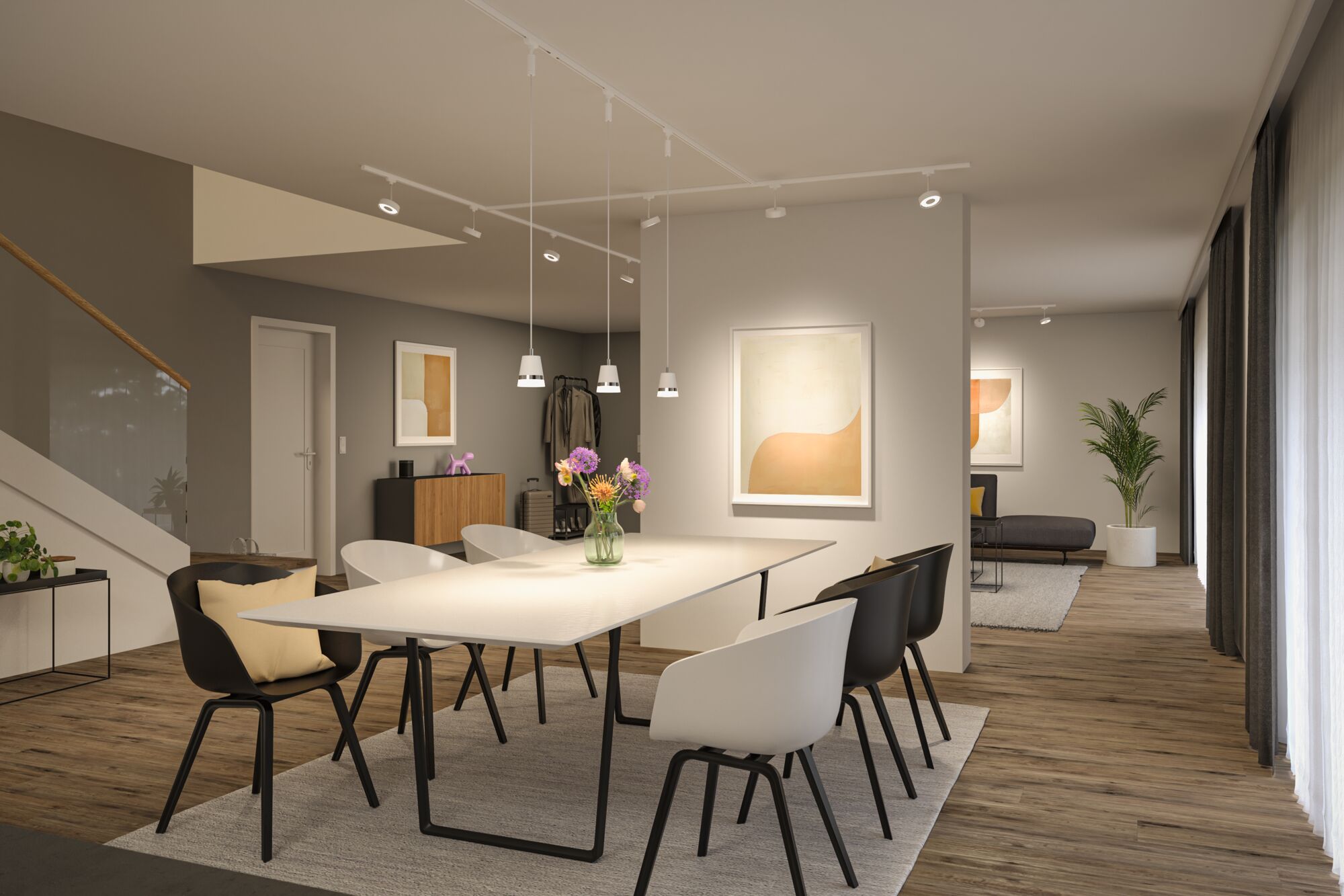 Modern dining area with white table, black and white chairs on wooden floor and LED ceiling lights.