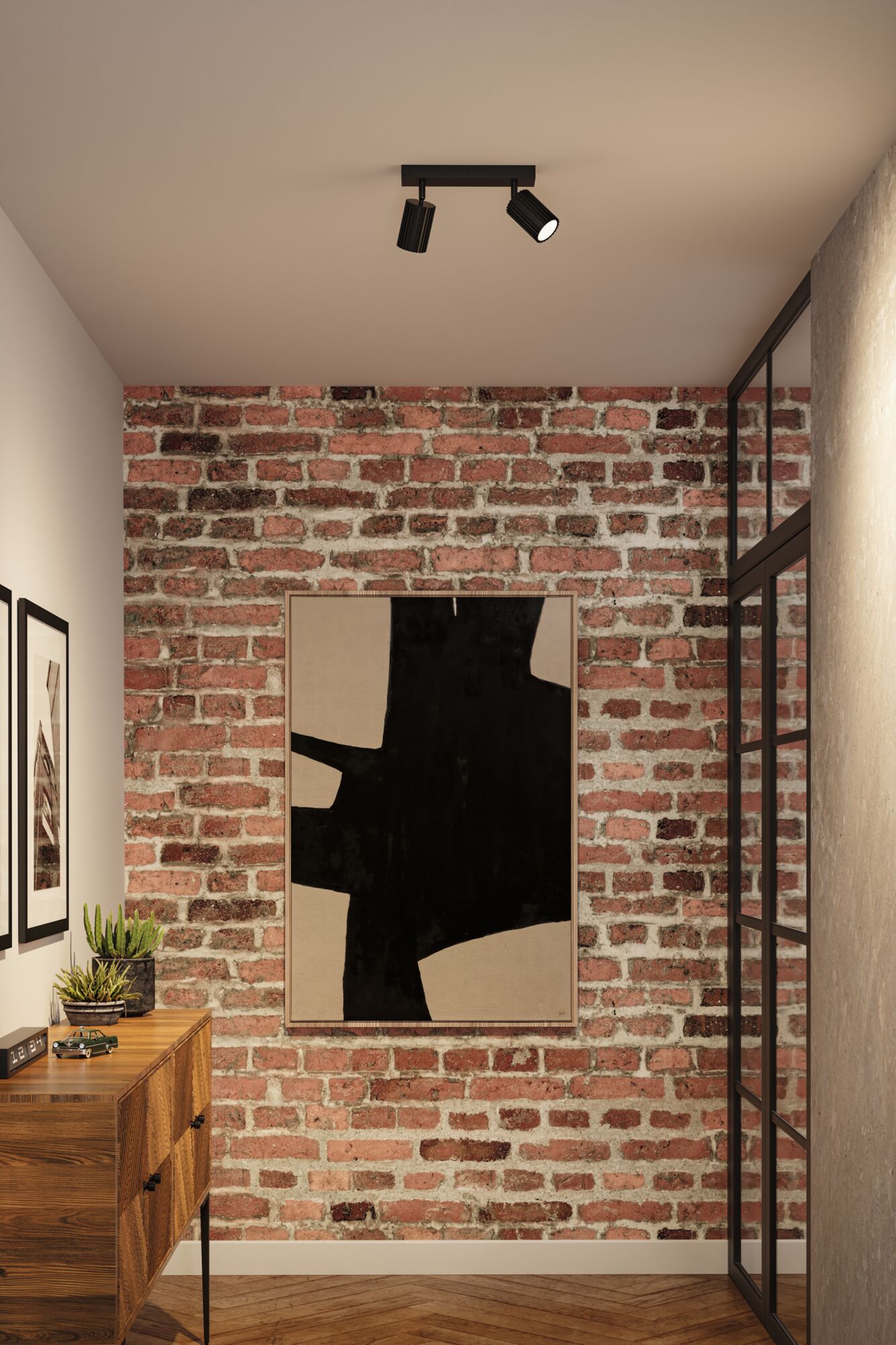 Schwarze Deckenstrahler aus Metall mit zwei verstellbaren Spots in modernem Flur mit Backsteinwand