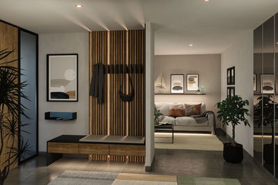 Modernes Wohnzimmer mit Holzpaneel, Sitzbank und indirekter LED-Beleuchtung für stilvolle Raumgestaltung.