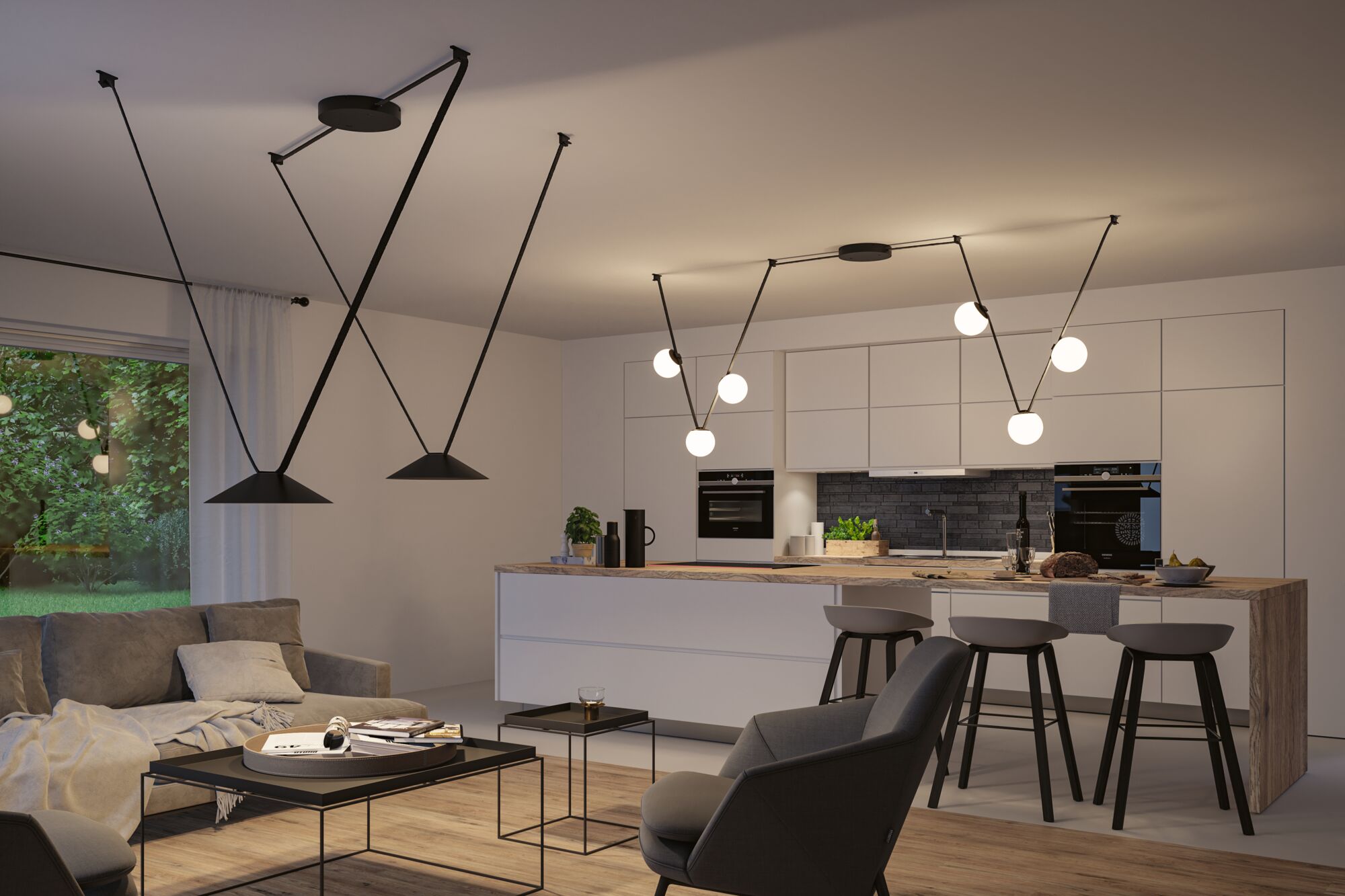 Moderne offene Wohnküche mit schwarzen Pendelleuchten und minimalistischer weißer Küchenzeile