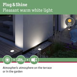 Warm white Plug & Shine recessed floor lights in aluminium create atmospheric garden and terrace lighting