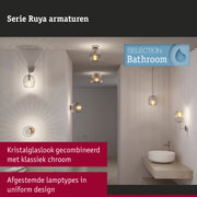 Badkamer met Ruya serie verlichting in kristalglas en klassiek chroom voor stijlvolle verlichting
