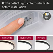 Finger adjusting White Select light colour before installation with warm, neutral, daylight LED ceiling lights