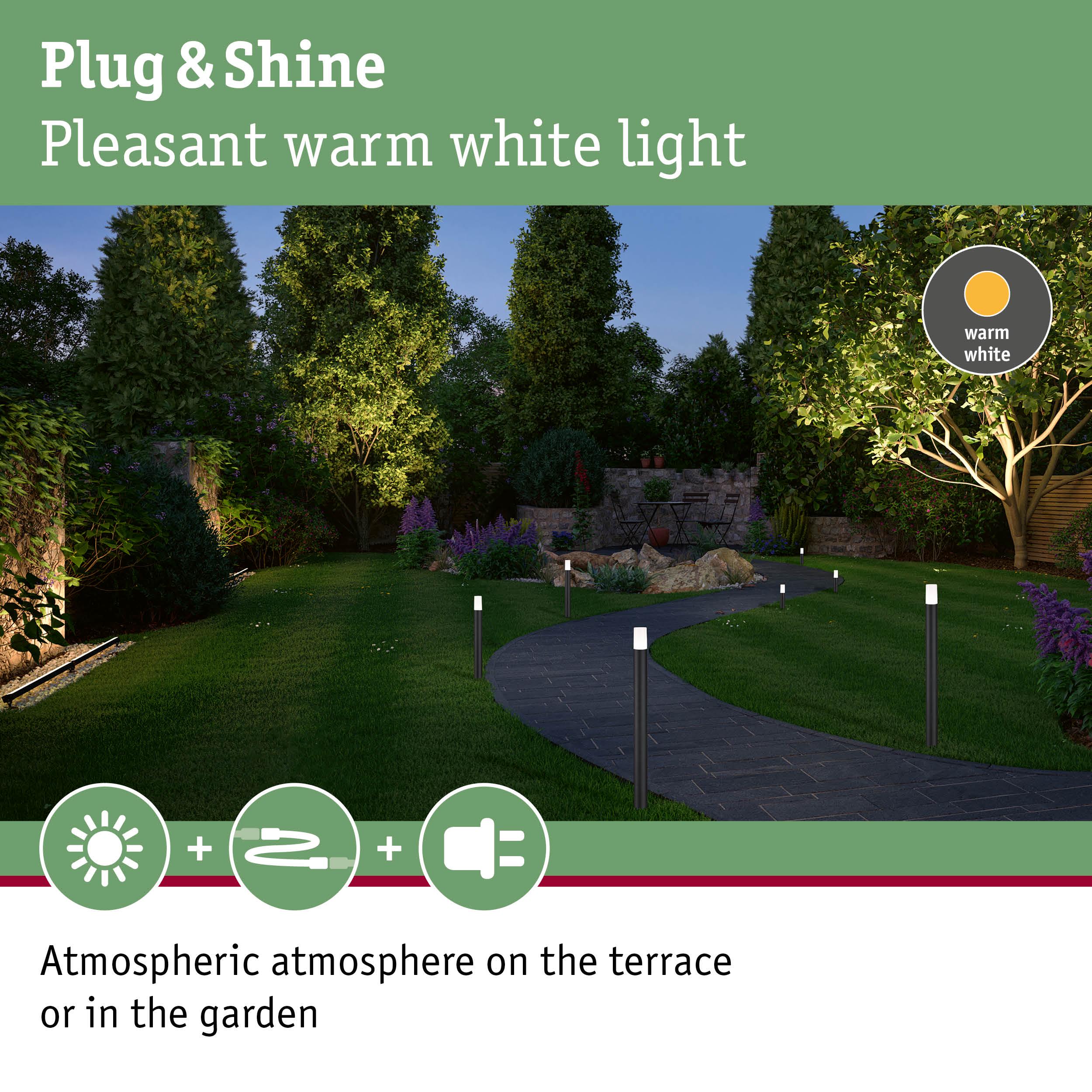 Garden path with warm white plug & shine light posts creating atmospheric outdoor lighting