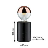 Modern table lamp with black marble base and half copper LED bulb, decorative lighting