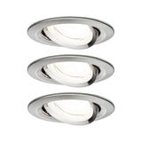 Three round recessed spotlights in brushed stainless steel with adjustable heads for versatile lighting