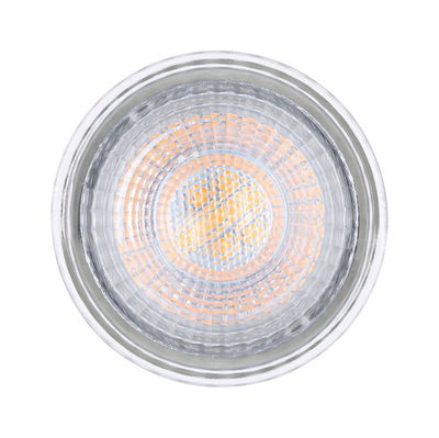 Round LED light with clear glass and warm white glow for energy-efficient lighting solutions