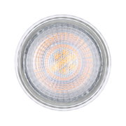 Round LED light with clear glass and warm white glow for energy-efficient lighting solutions