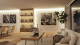 Moderne woonkamer met indirecte LED-verlichting, houten tafel, bank en decoratieve zwart-wit foto’s.