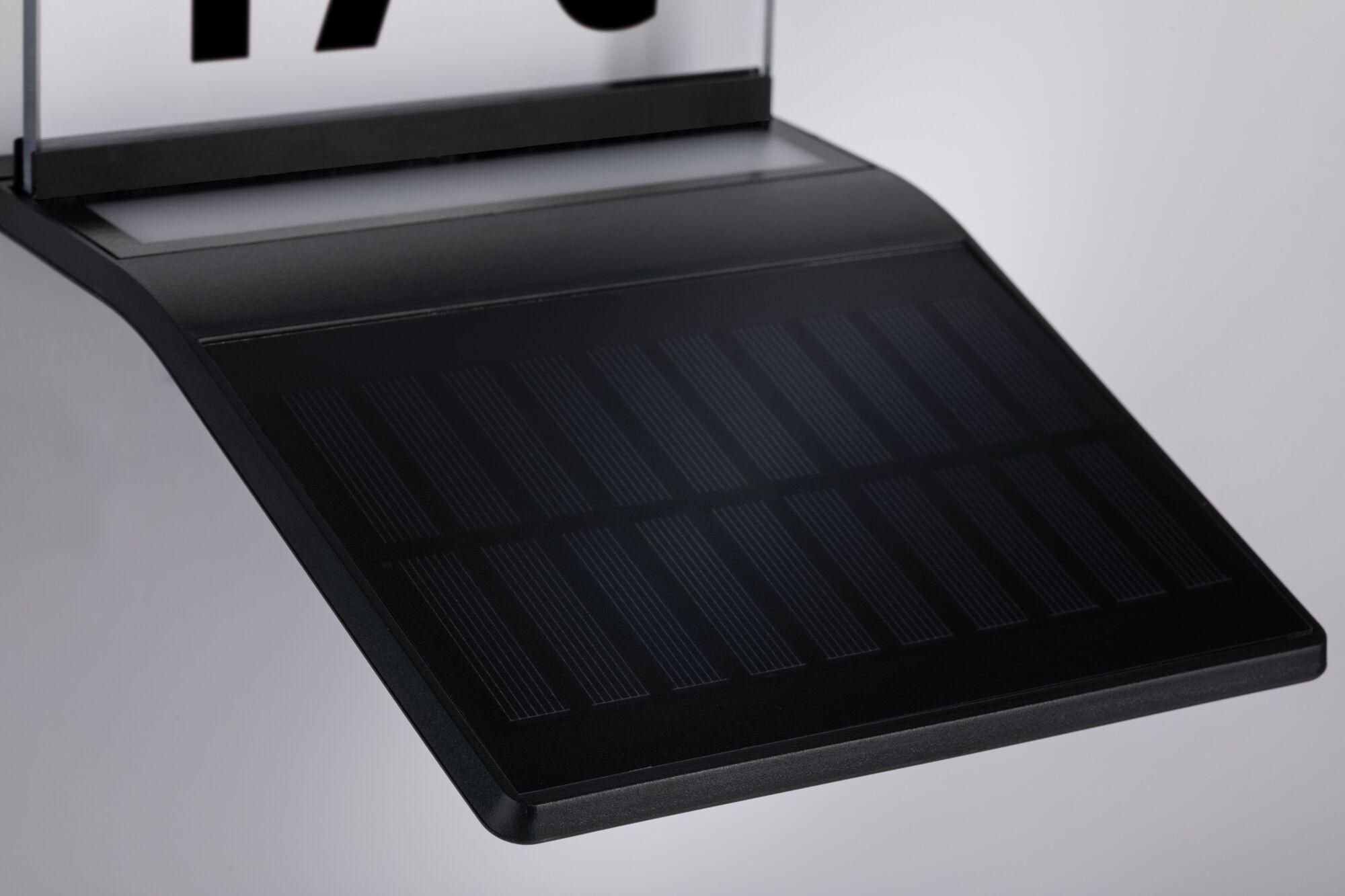 Black solar panel with glass and plastic frame for sustainable energy generation