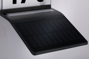 Black solar panel with glass and plastic frame for sustainable energy generation