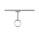 Moderner runder LED-Strahler aus Chrom an Schienensystem für flexible Raumbeleuchtung