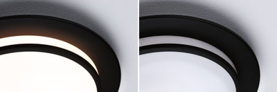 Black round ceiling light with warm and cool white LED illumination for modern home lighting