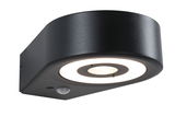 Black metal LED wall light with motion sensor and circular light ring for outdoor lighting